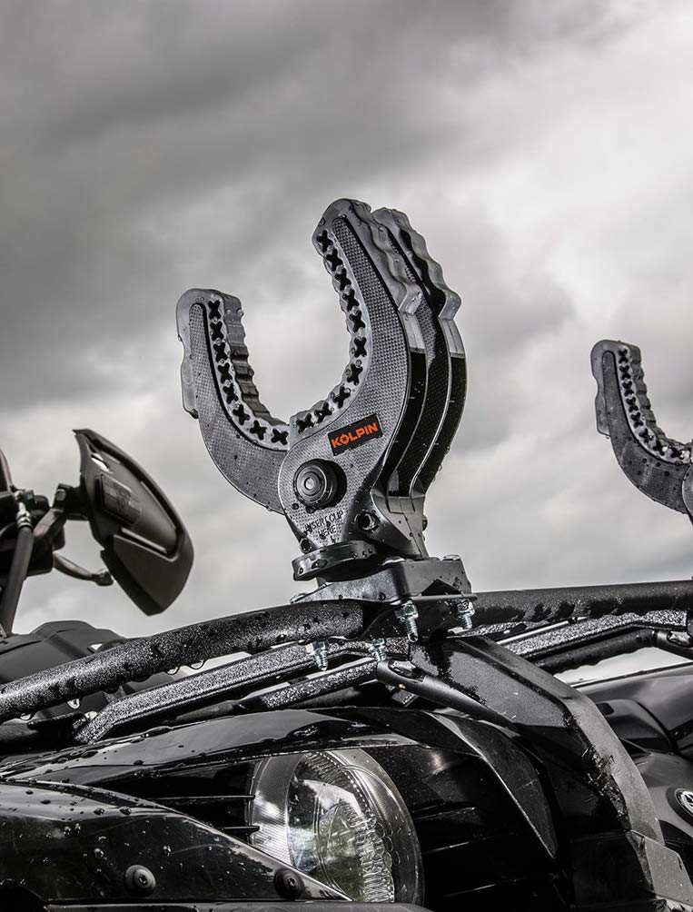 Kolpin mounted on ATV side rail showing stable hold and easy access while riding