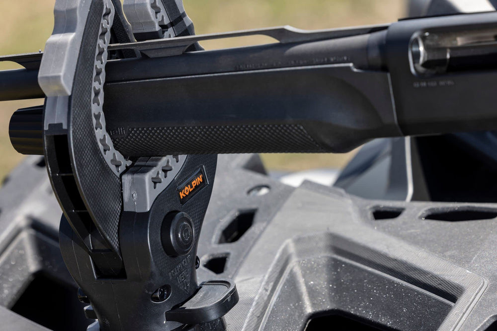 Kolpin Rhino Grip with included mounting plates and hardware showing complete installation kit
