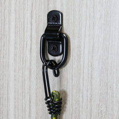 KOPKIO D-ring in use with a ratchet strap showing reliable load restraint