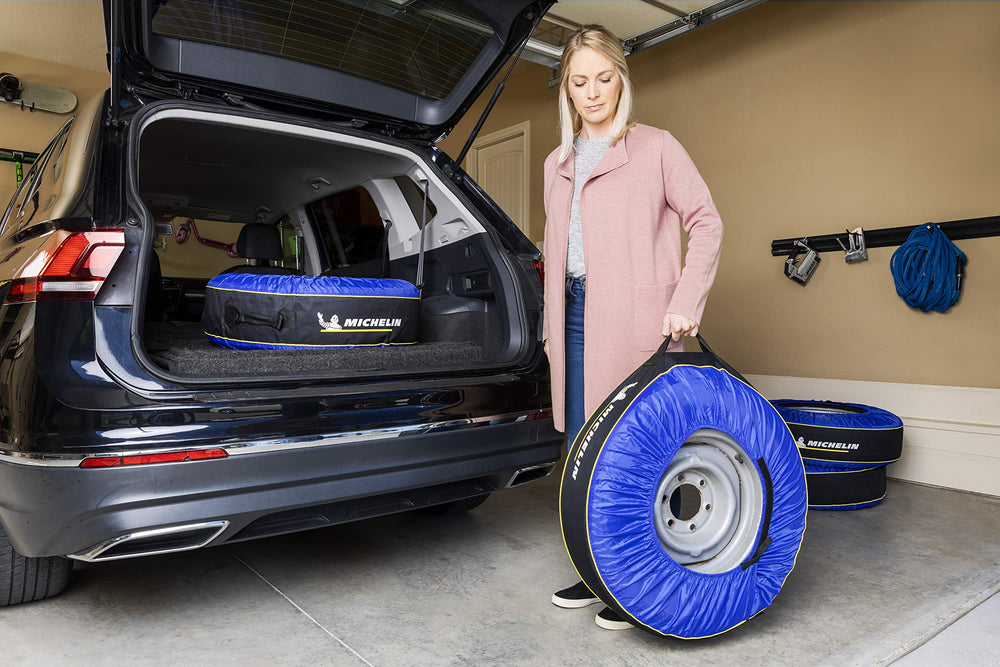 Kurgo Michelin 80 being carried by person showing hands and clothes stay clean benefit