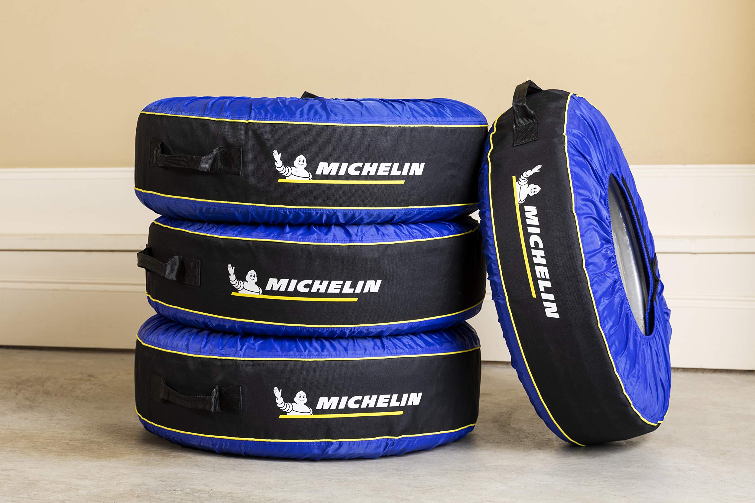 Kurgo Michelin 80 stacked tires in garage showing space-saving organization benefit