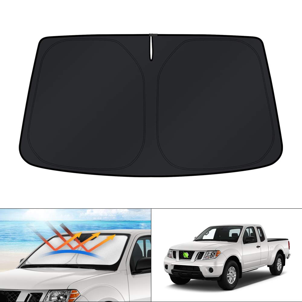 KUST front view installed on Nissan Frontier blocking sunlight and protecting dash