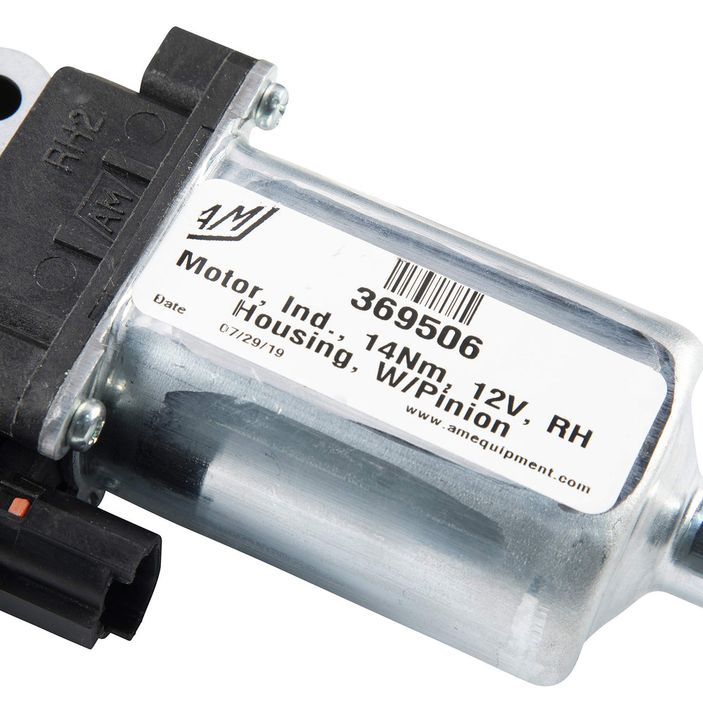 Kwikee motor next to hand showing size for quick visual scale and fit confirmation