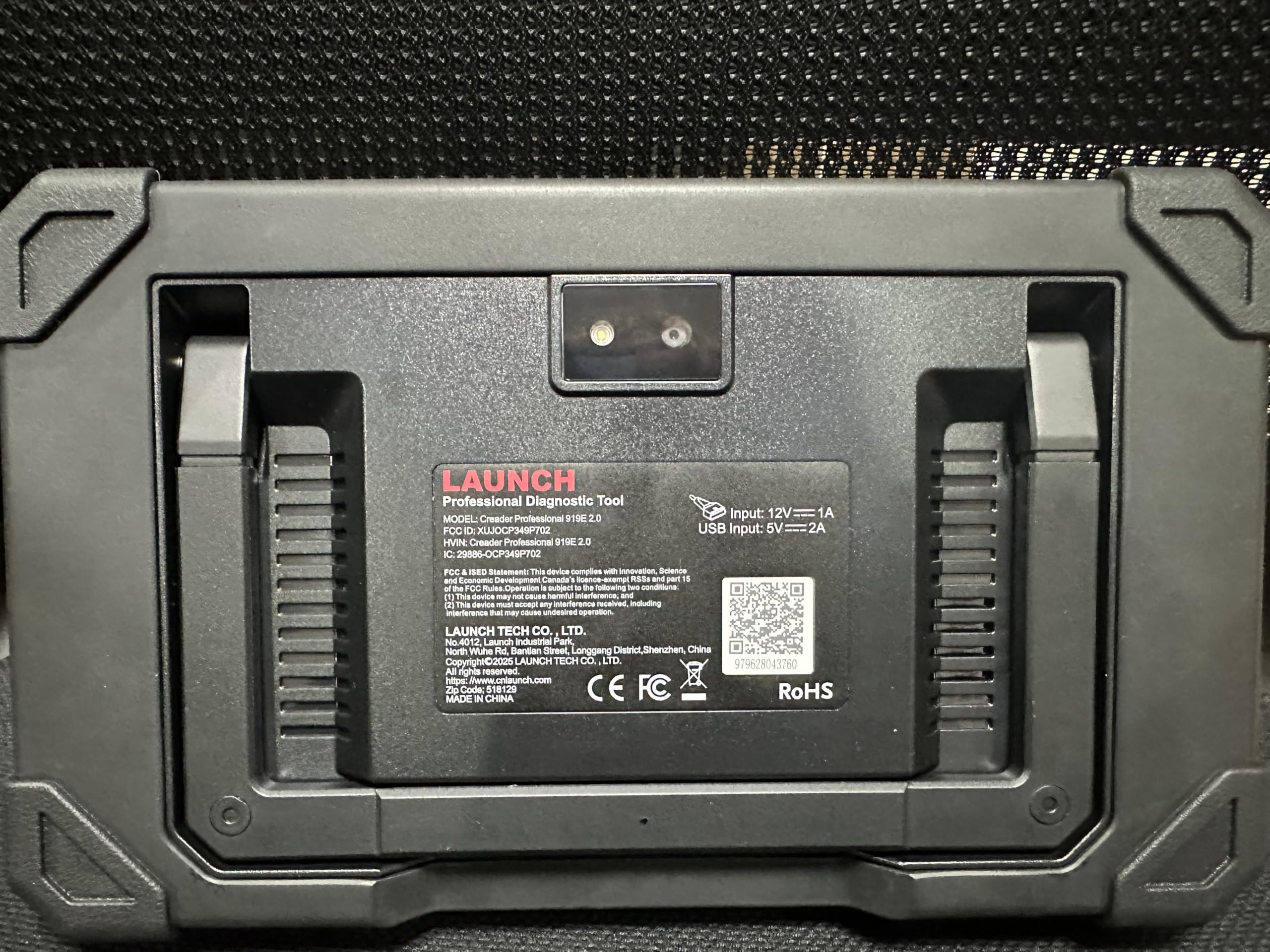 LAUNCH product label close-up showing memory, Android and update features