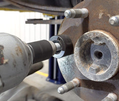Lisle 22800 positioned on a wheel stud in hub, ensures precise stud seating