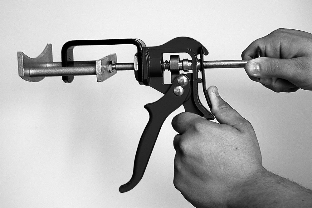 Lisle 25750 in use on caliper speeds dual-piston pad replacement
