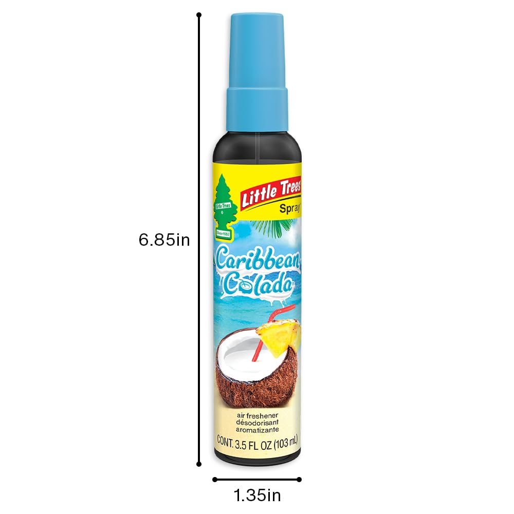 LITTLE TREES bottle beside pineapple and coconut highlighting the tropical aroma