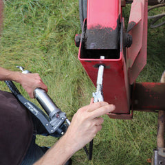 LockNLube attached to grease gun demonstrating secure connection benefit