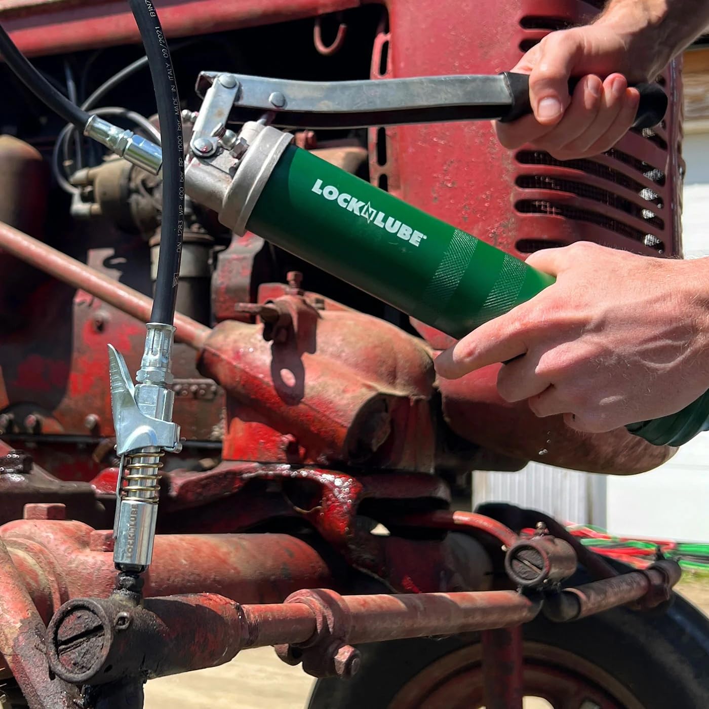 LockNLube stamped 10,000 PSI marking indicating high-pressure reliability