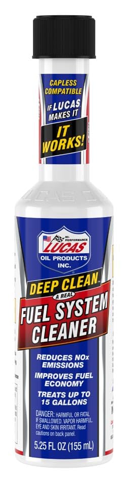 Applying Lucas Oil cleaner into fuel tank with funnel demonstrating easy maintenance
