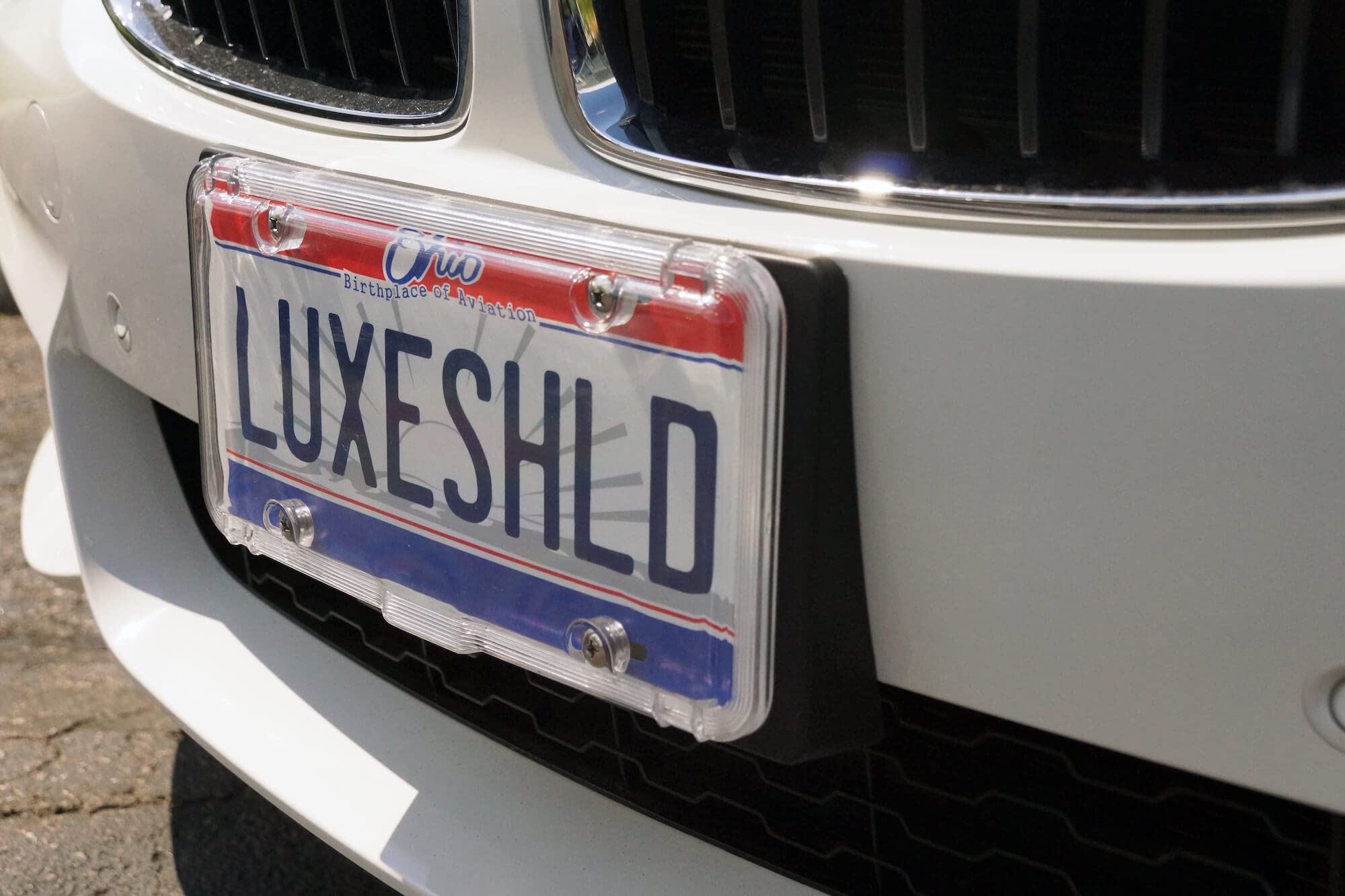 Luxe Shield installed on a vehicle front showing secure fit and high clarity