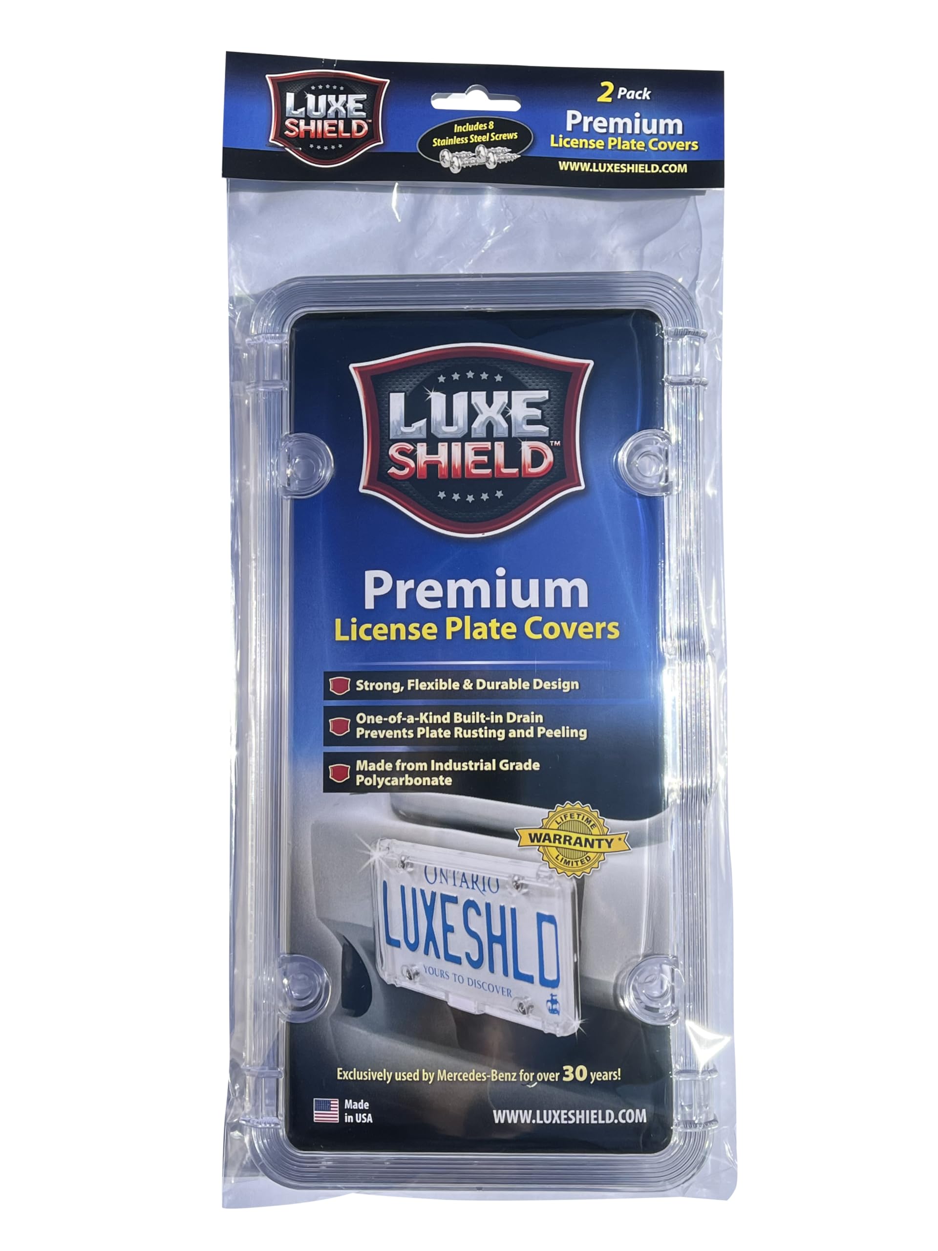 Luxe Shield installed on a vehicle rear demonstrating all-weather plate protection