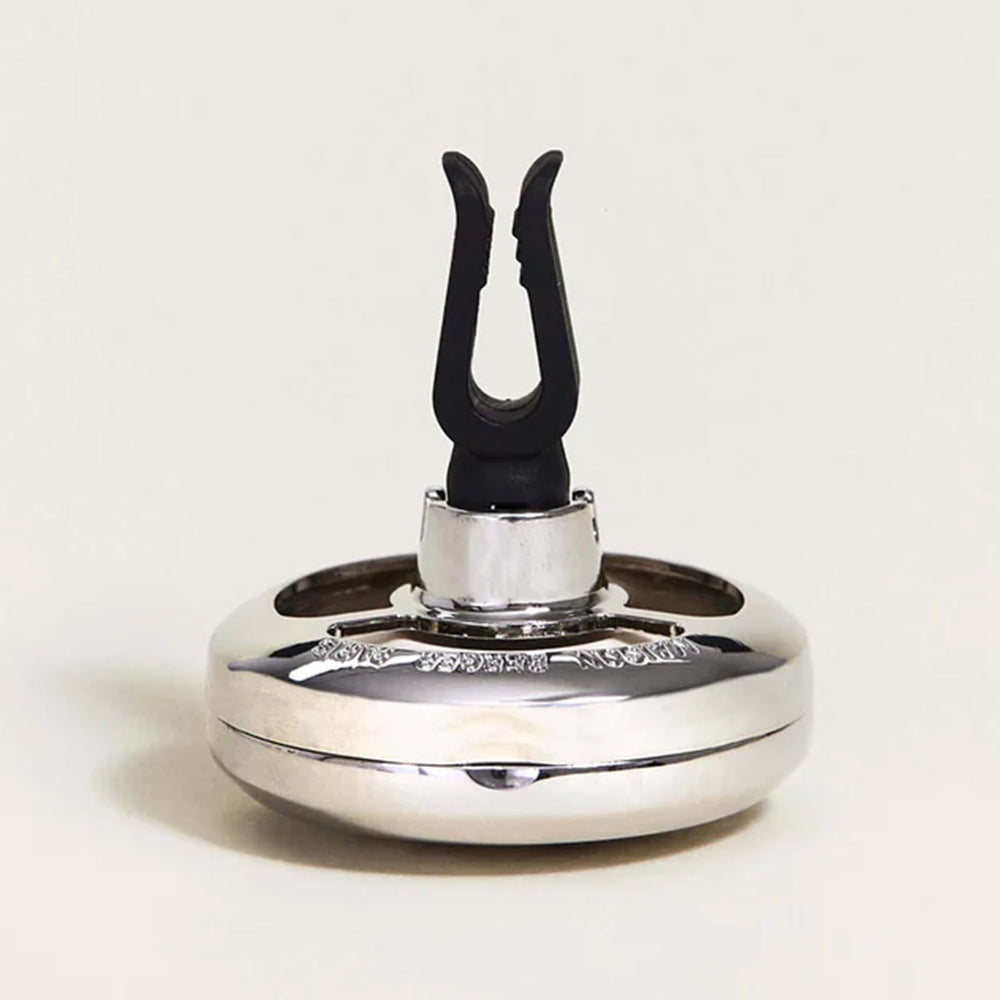 MAISON BERGER clip mechanism detail demonstrating secure, rattle-free grip