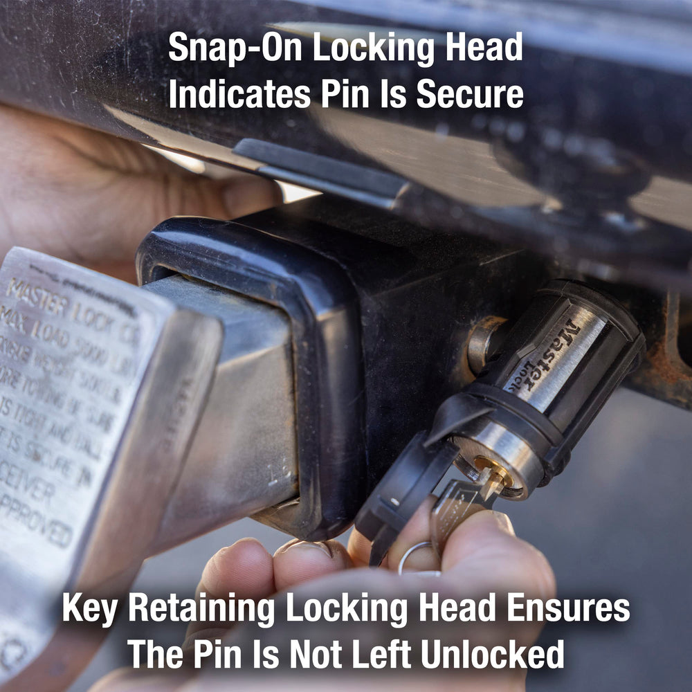 Master Lock installed on trailer receiver demonstrating secure fit in 5/8 inch receiver for theft deterrence