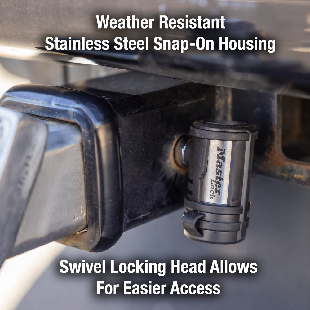 Master Lock mounted on coupler latch illustrating snug attachment and weather-resistant components