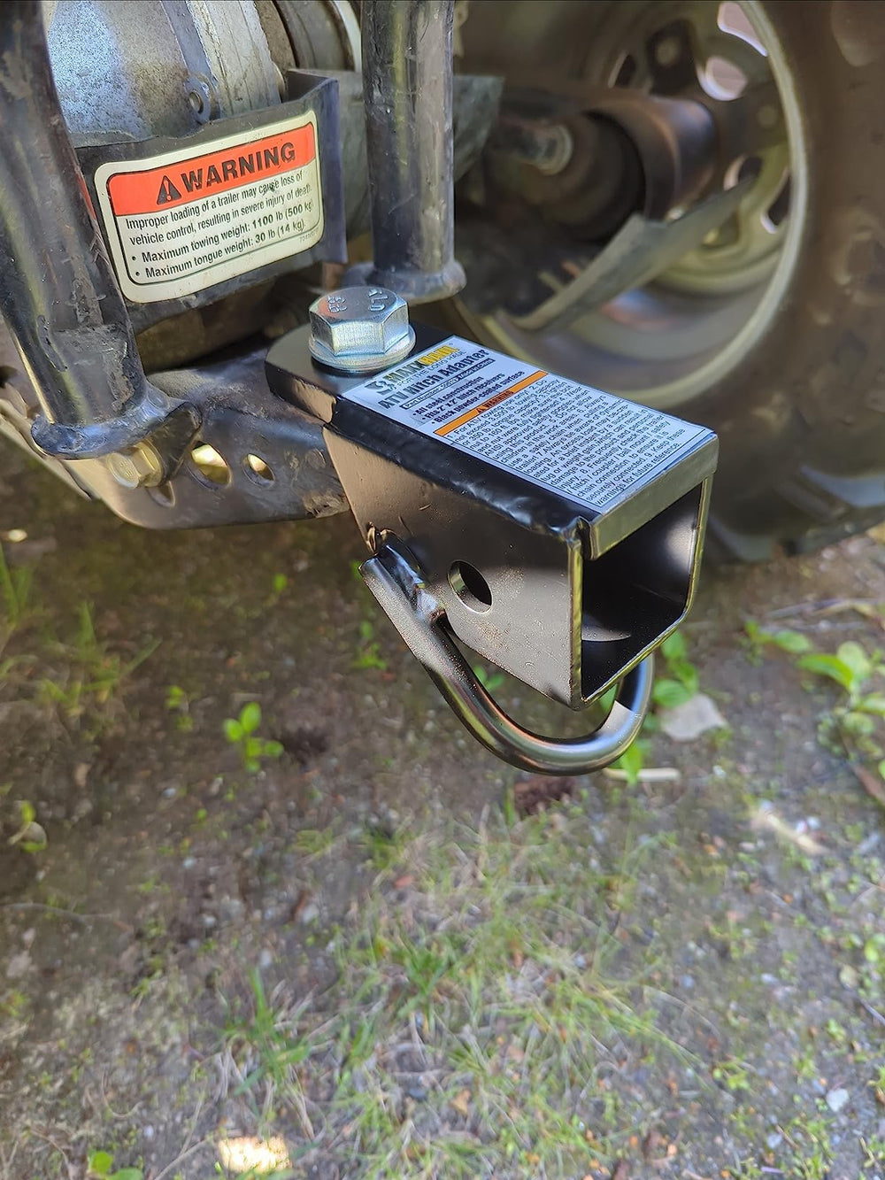 MAXXHAUL installed on trailer in a field showing practical towing use