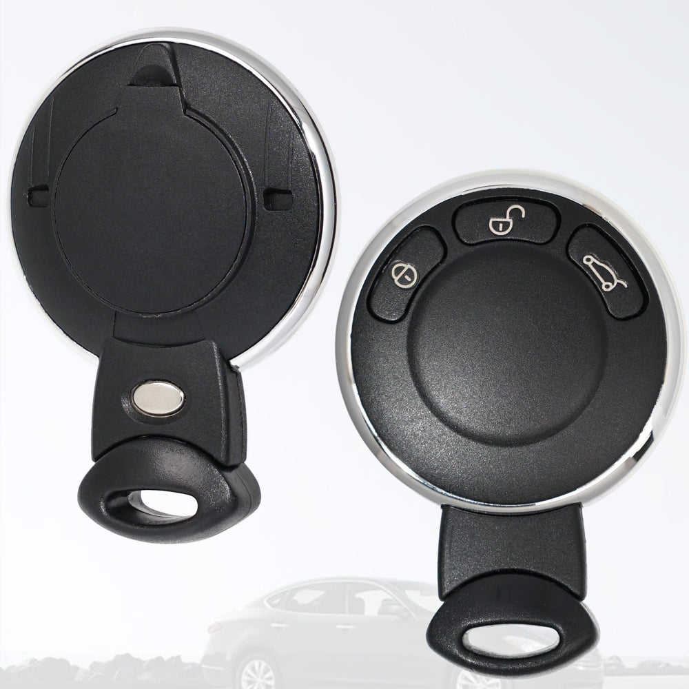 MechanMagic key fob next to a coin showing compact size for easy carrying