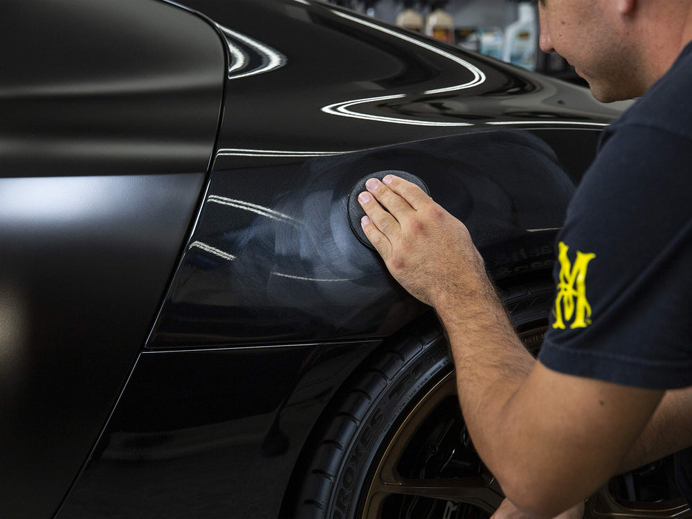 Meguiar's side-by-side before and after showing visible gloss improvement