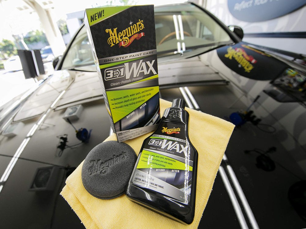 Meguiar's bottle on car trunk in outdoor scene highlighting road-ready protection