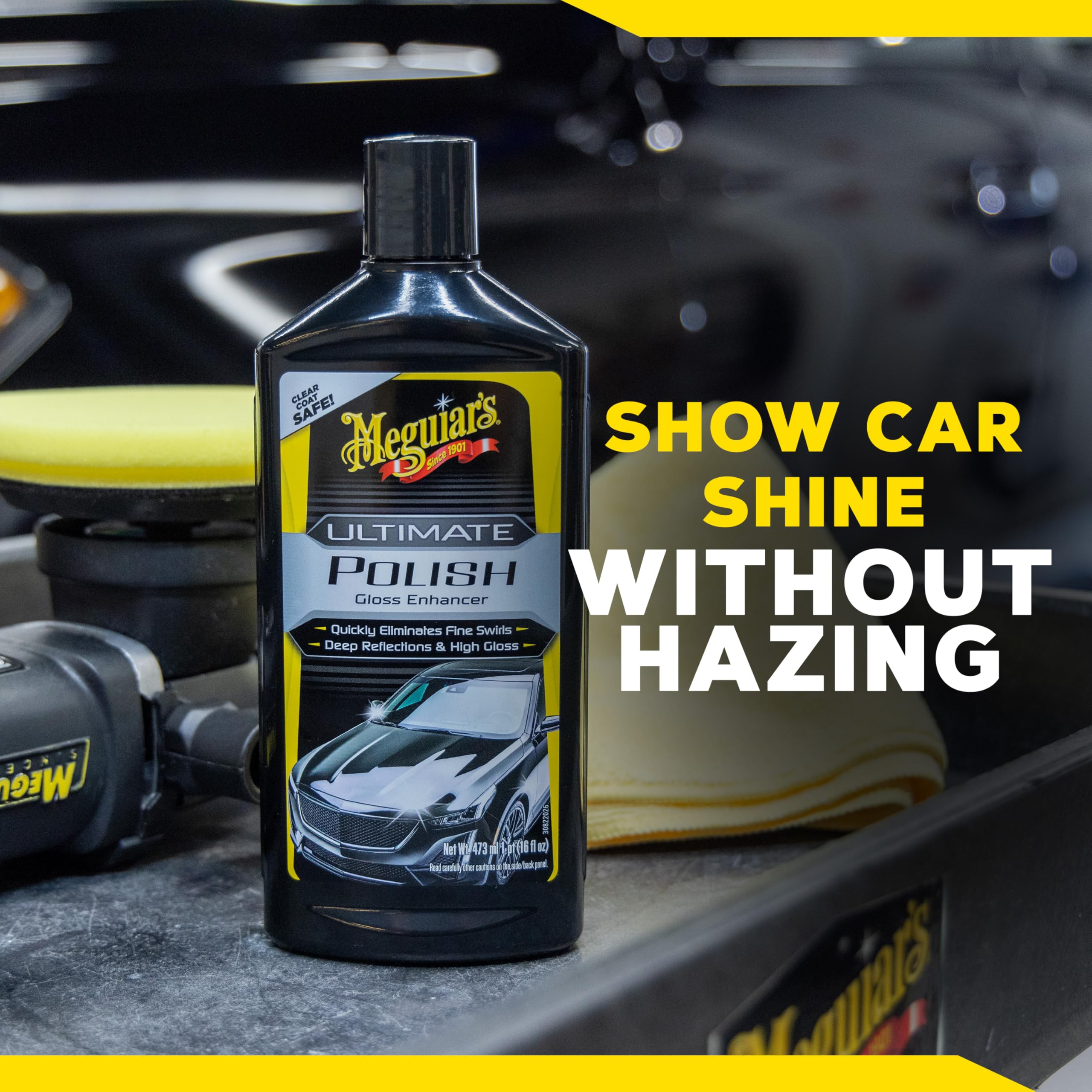 Meguiar's bottle placed on dark car panel highlighting colour depth improvement