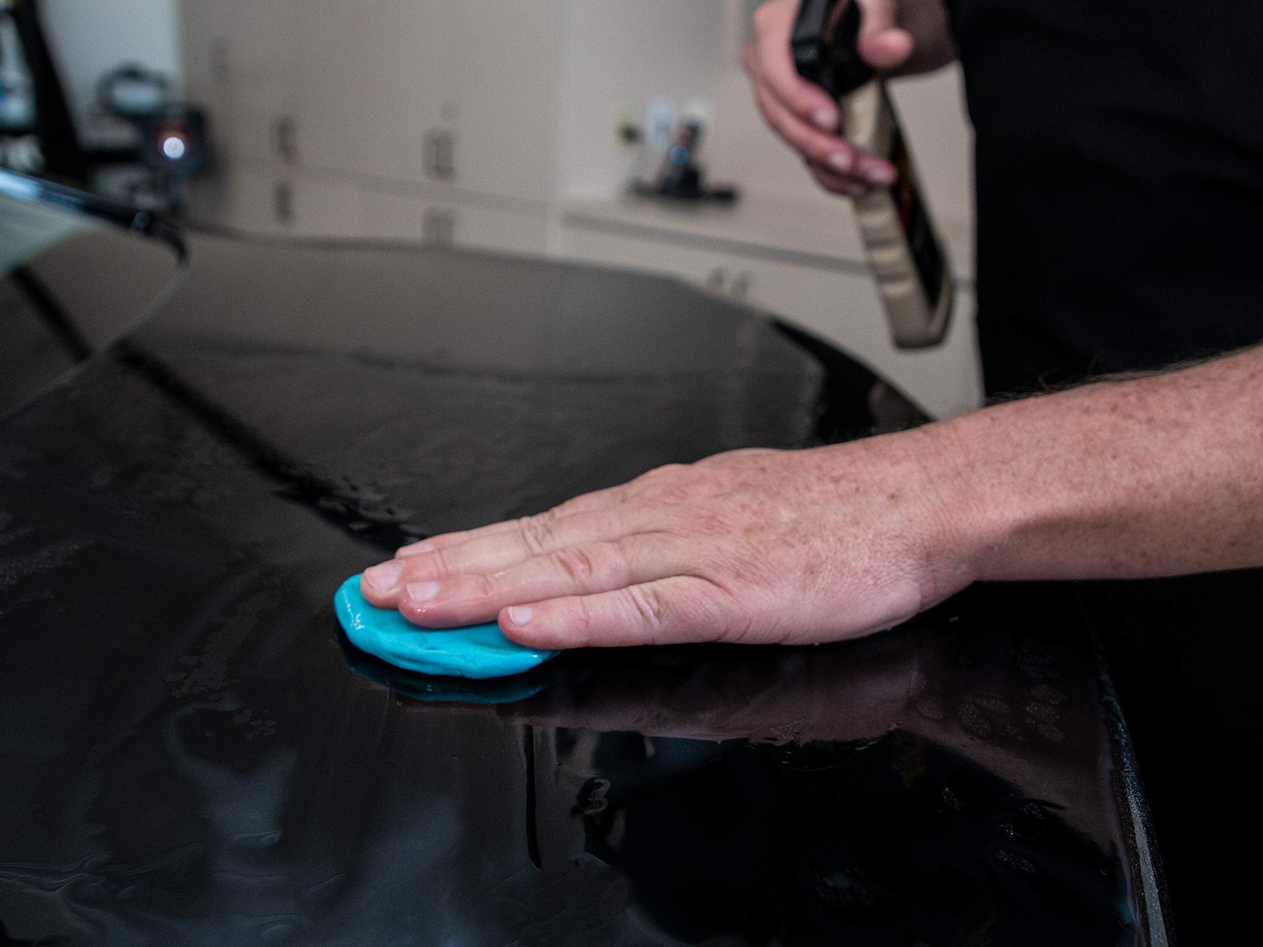 After-clay paint close-up showing Meguiar's smooth surface benefit and improved gloss