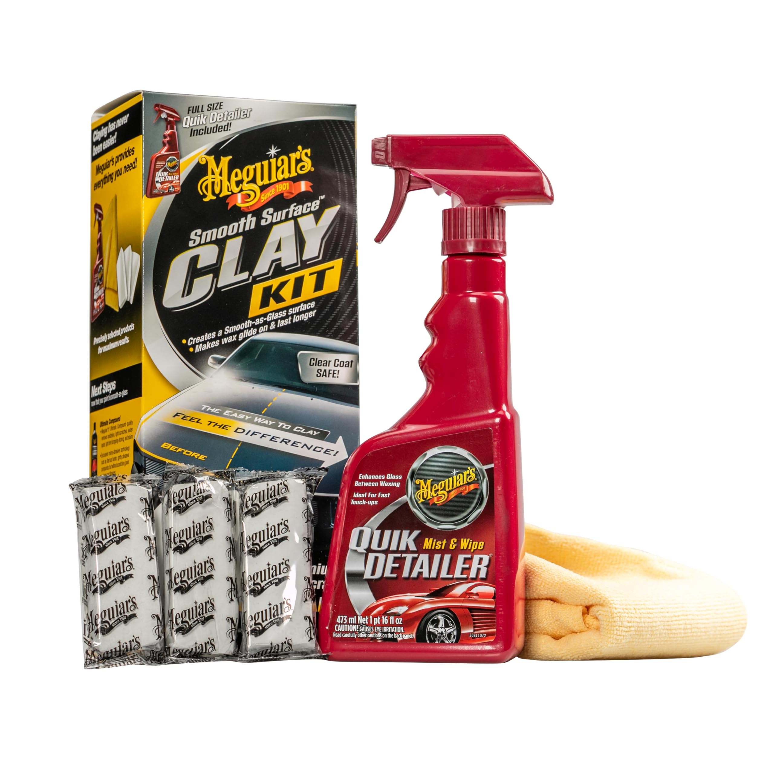 Meguiar's clay kit components laid out to show clay bars, spray, and towel benefits