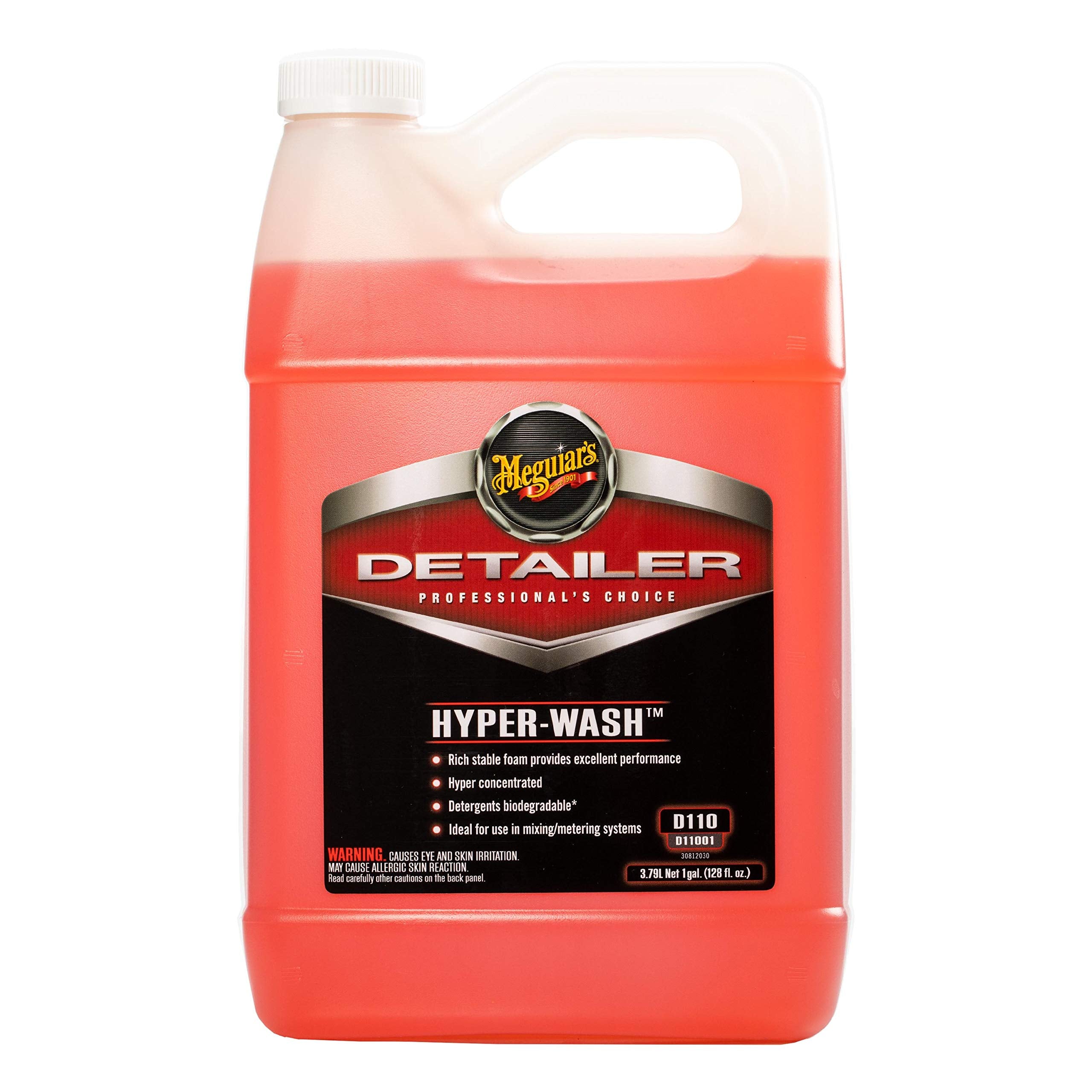 Meguiar's pouring concentrate into a measuring cup for correct dilution and savings