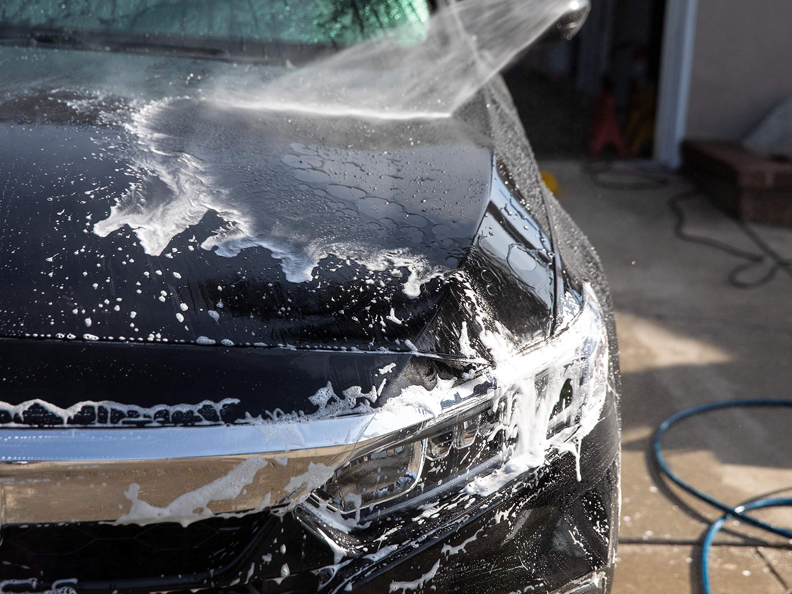 Meguiar's on waxed paint close-up showing cleaning while preserving shine
