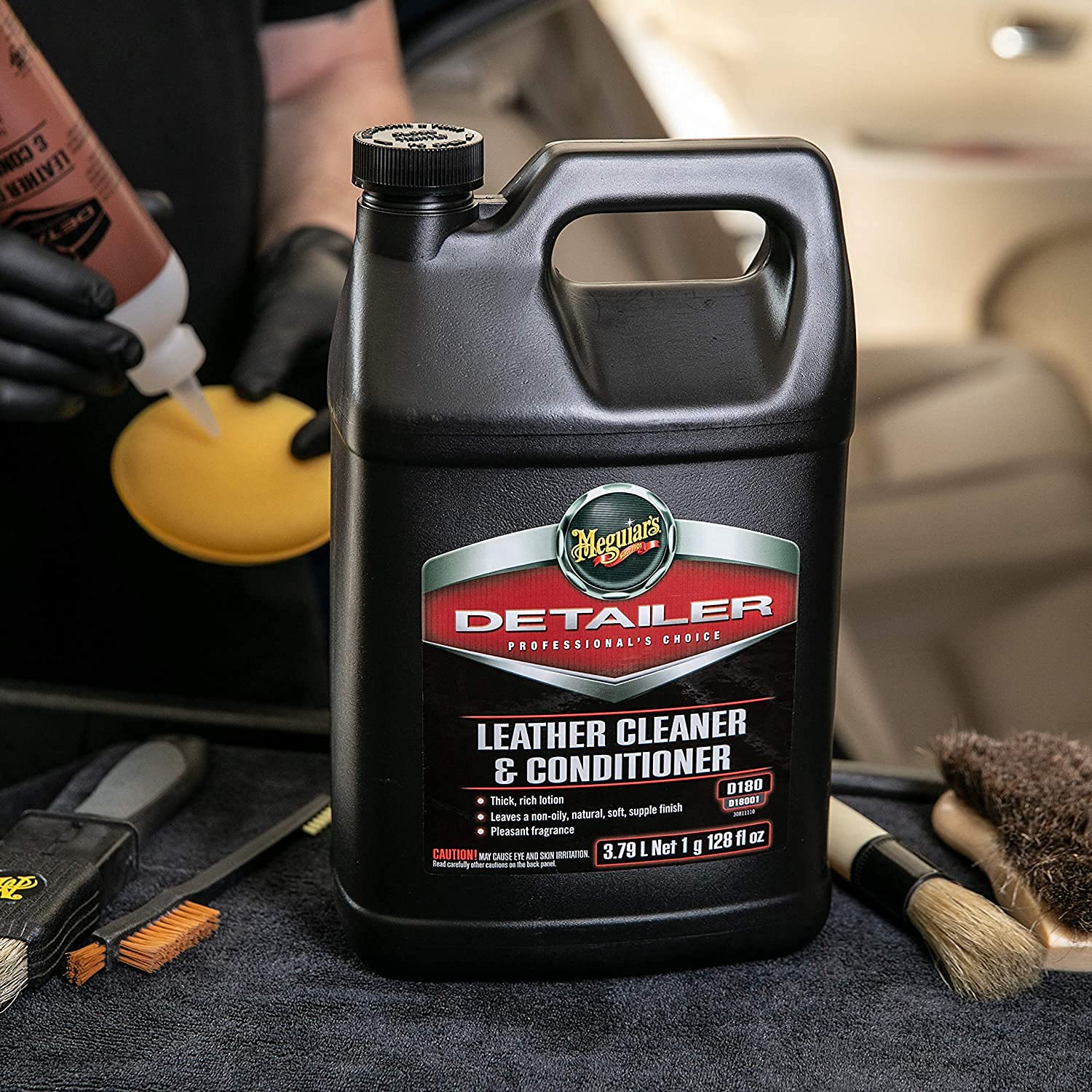 Meguiar's D18001 applied to car seat demonstrating cleaning and restored appearance