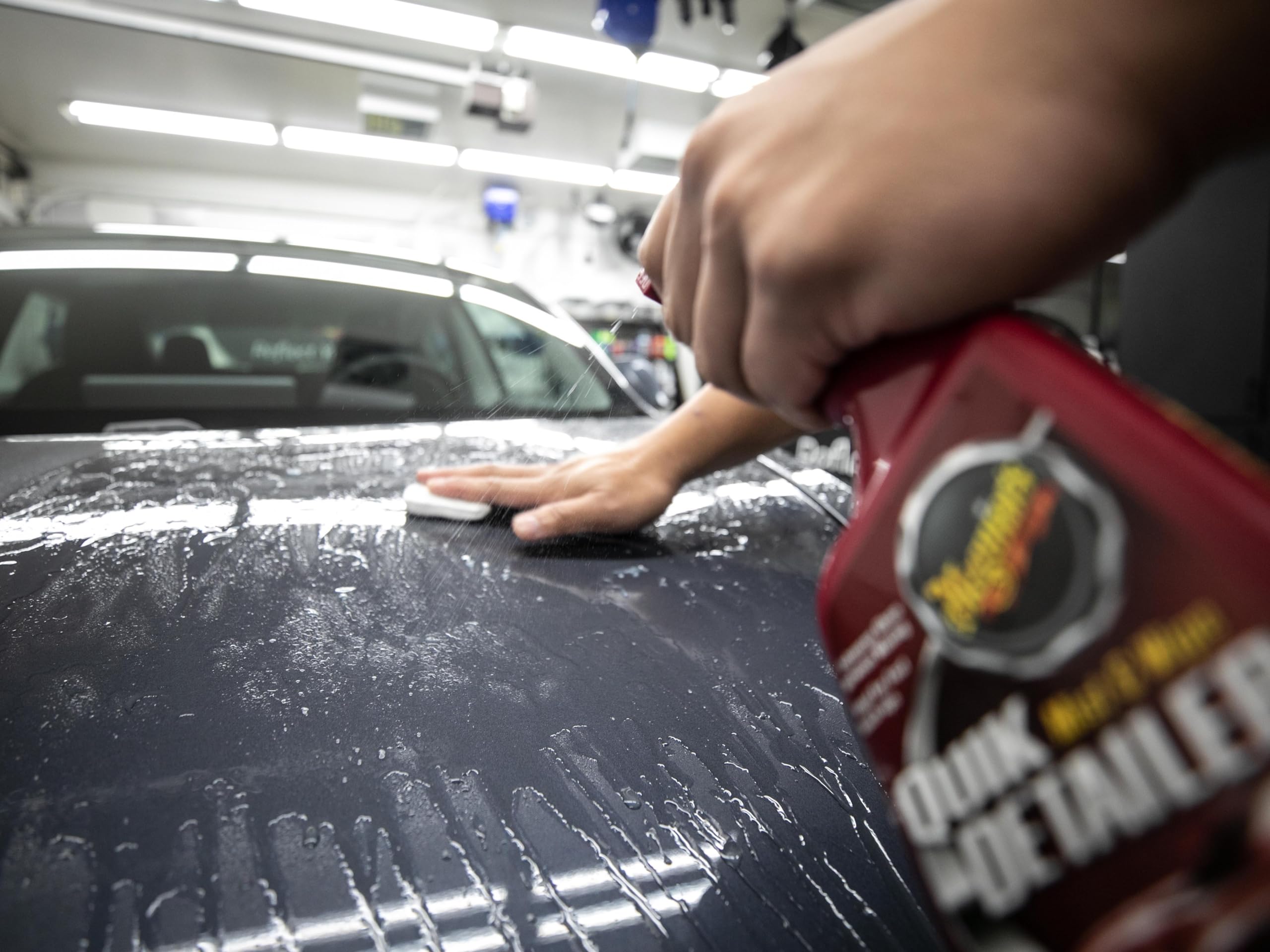 Meguiar's detailer spray misting paint to lubricate and reduce marring risk