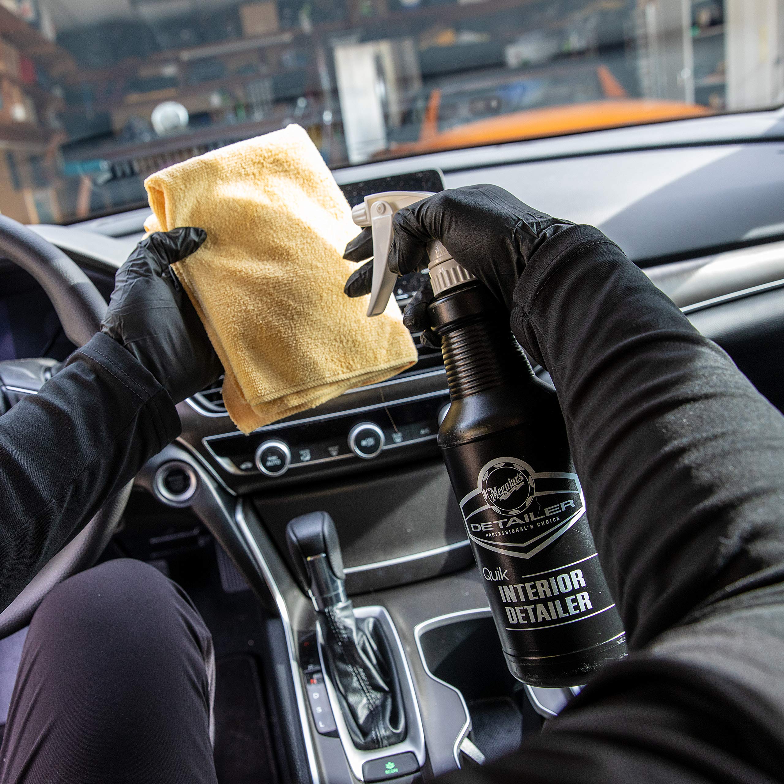 Meguiar's refreshing a fabric seat to remove dust and revive texture
