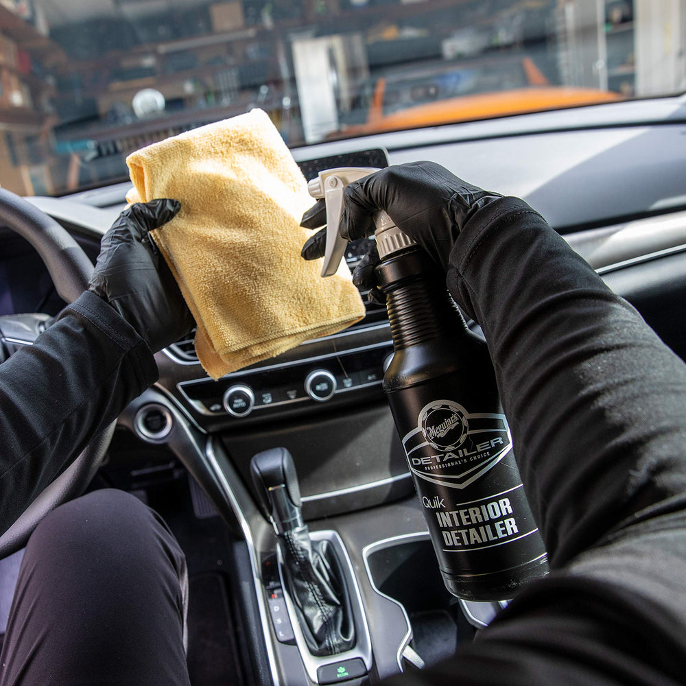 Meguiar's refreshing a fabric seat to remove dust and revive texture
