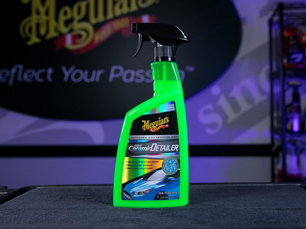 Meguiar's 26 oz bottle next to soda can for clear size comparison