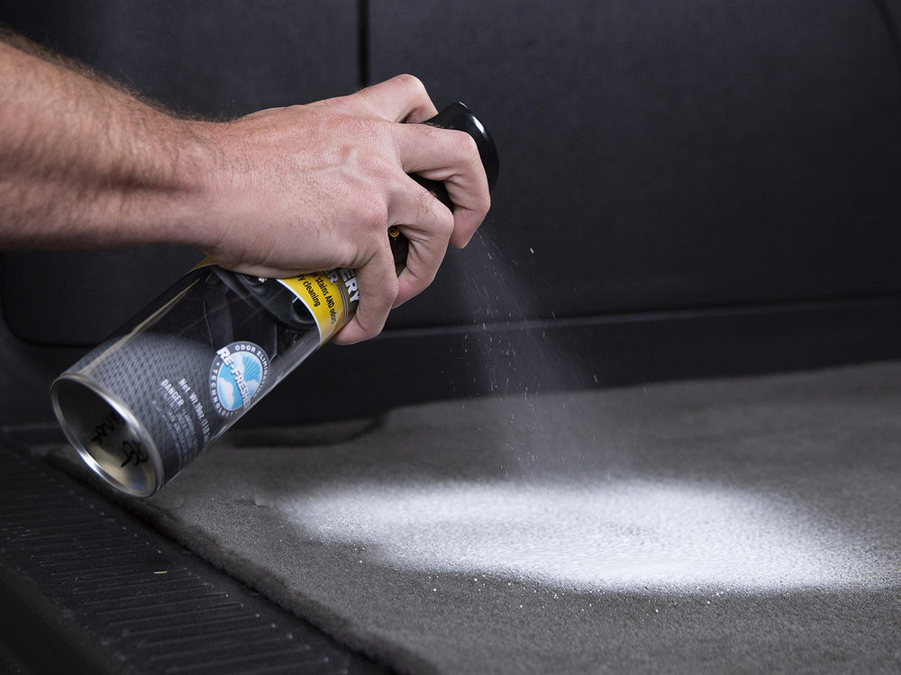 Meguiar's in use on a car seat spot cleaning, demonstrating fast stain removal benefit