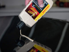 Meguiar's in-use with DA polisher on car panel demonstrating efficient defect removal