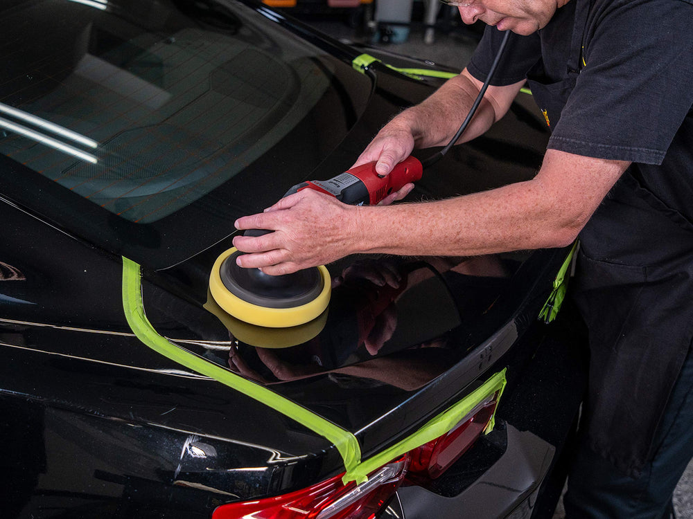 Meguiar's M09 being wiped with microfiber showing clean finishing