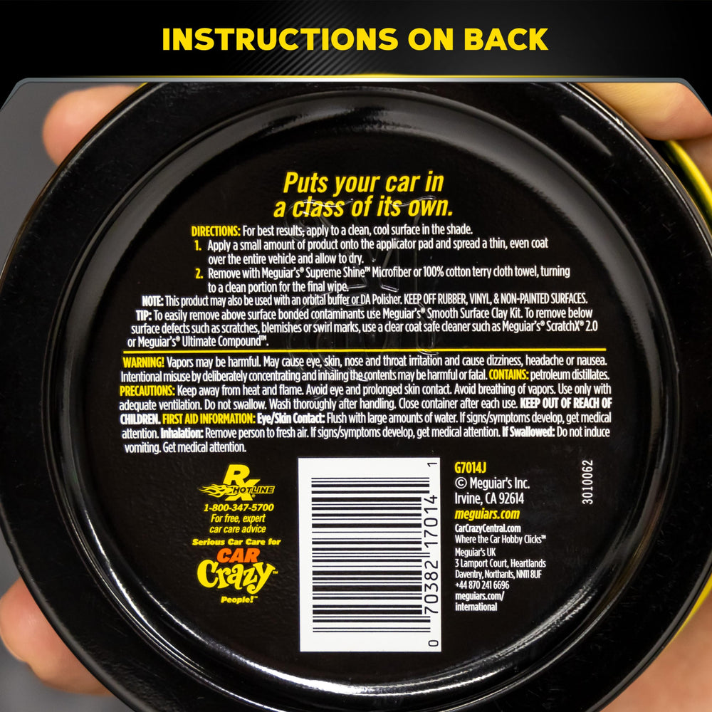 Meguiar's tin held in hand illustrating 11 oz size and convenient portability