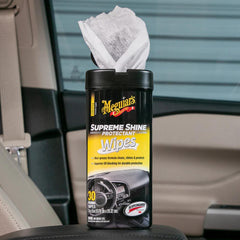 Meguiar's wipe being used on dashboard showing improved shine and protected finish benefit