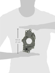 Melling oil pump installed next to engine for scale, shows direct-fit convenience