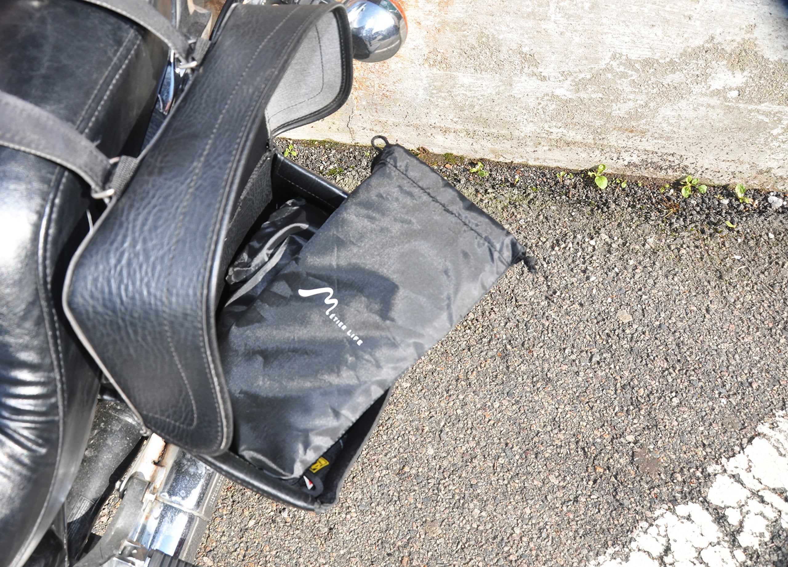 Metier Life packed in nylon drawstring bag for compact travel convenience