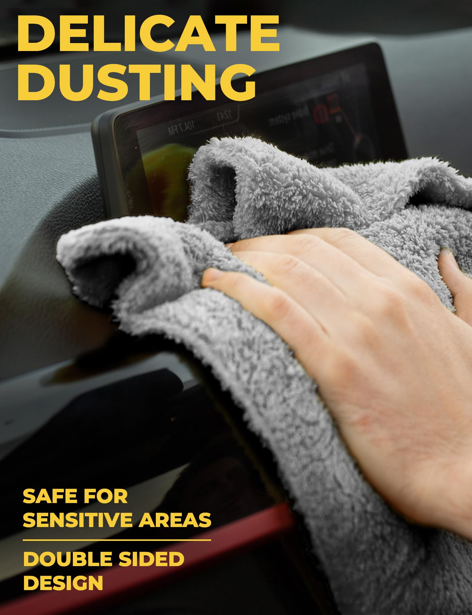 Mighty Cleaner towel dusting a car dashboard safely without leaving lint or marks