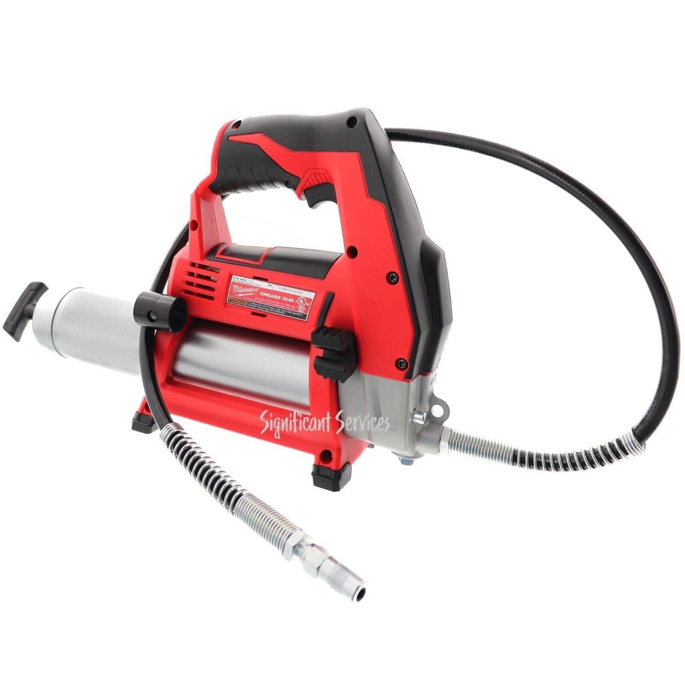 Milwaukee grease gun in hand showing scale and ergonomic balance for comfort