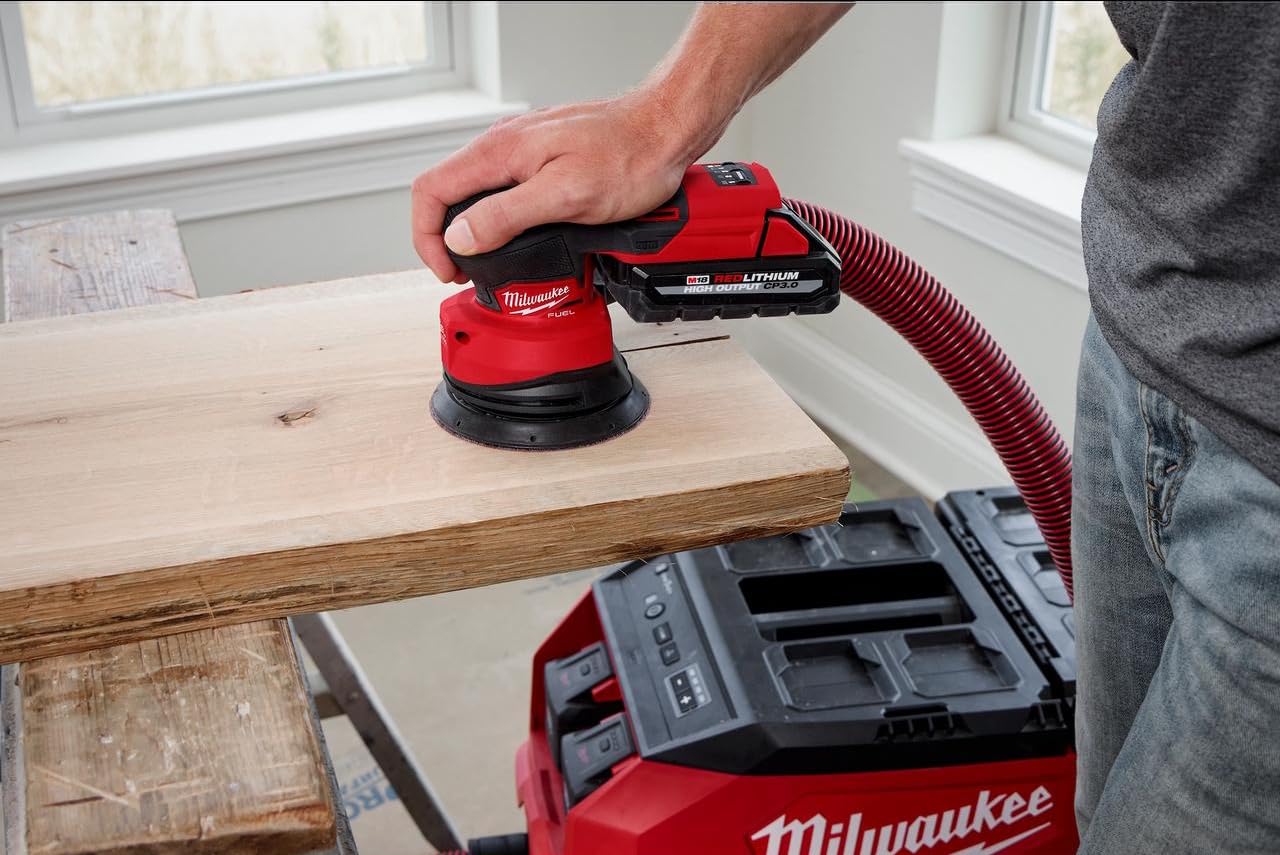 Milwaukee M18 FUEL sander side dust port for cleaner workspace and efficient extraction