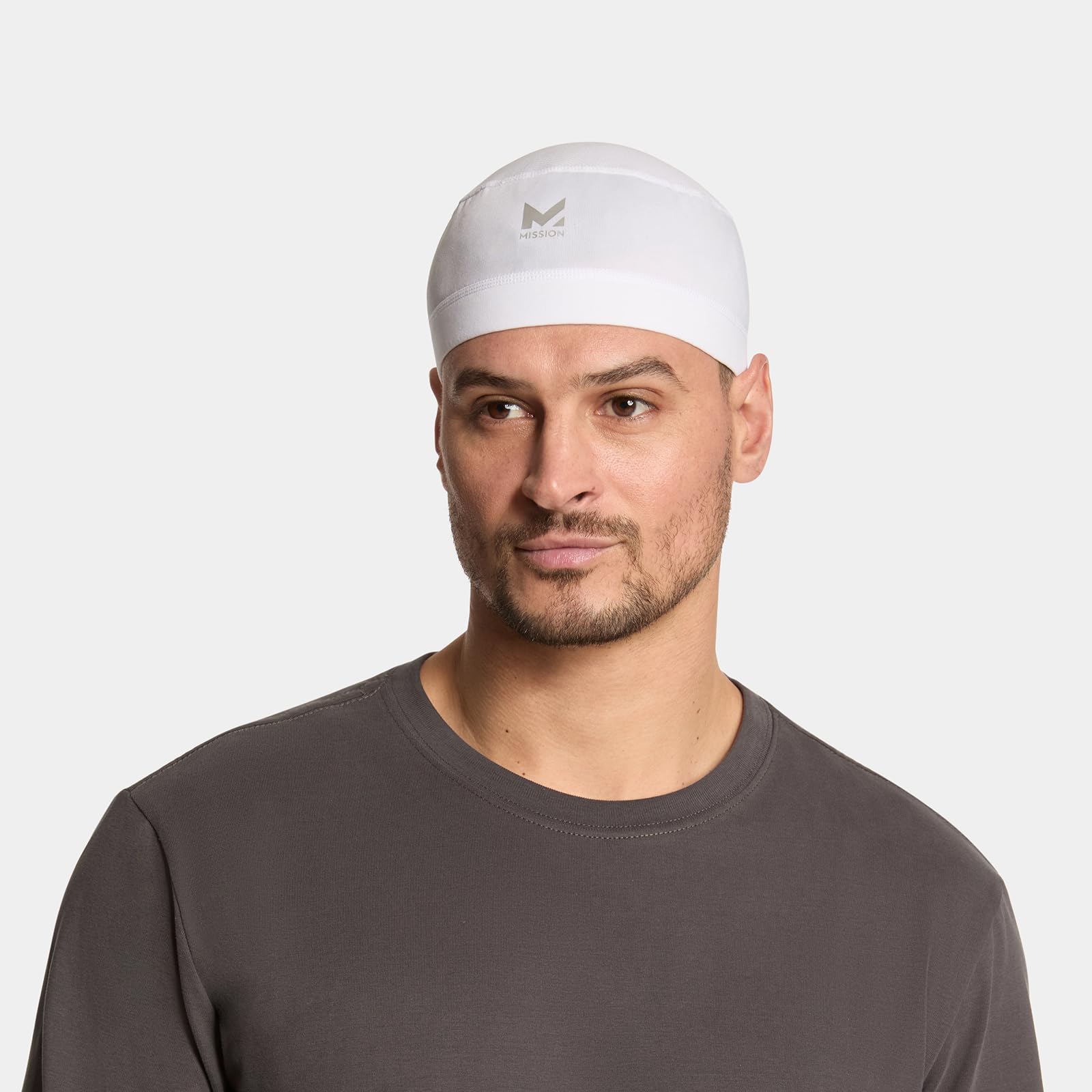 MISSION runner wearing liner outdoors showing sun protection benefit