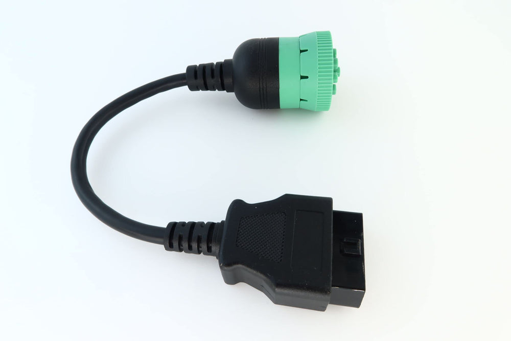 MITOB adapter plugged into vehicle J1939 port enabling telematics access