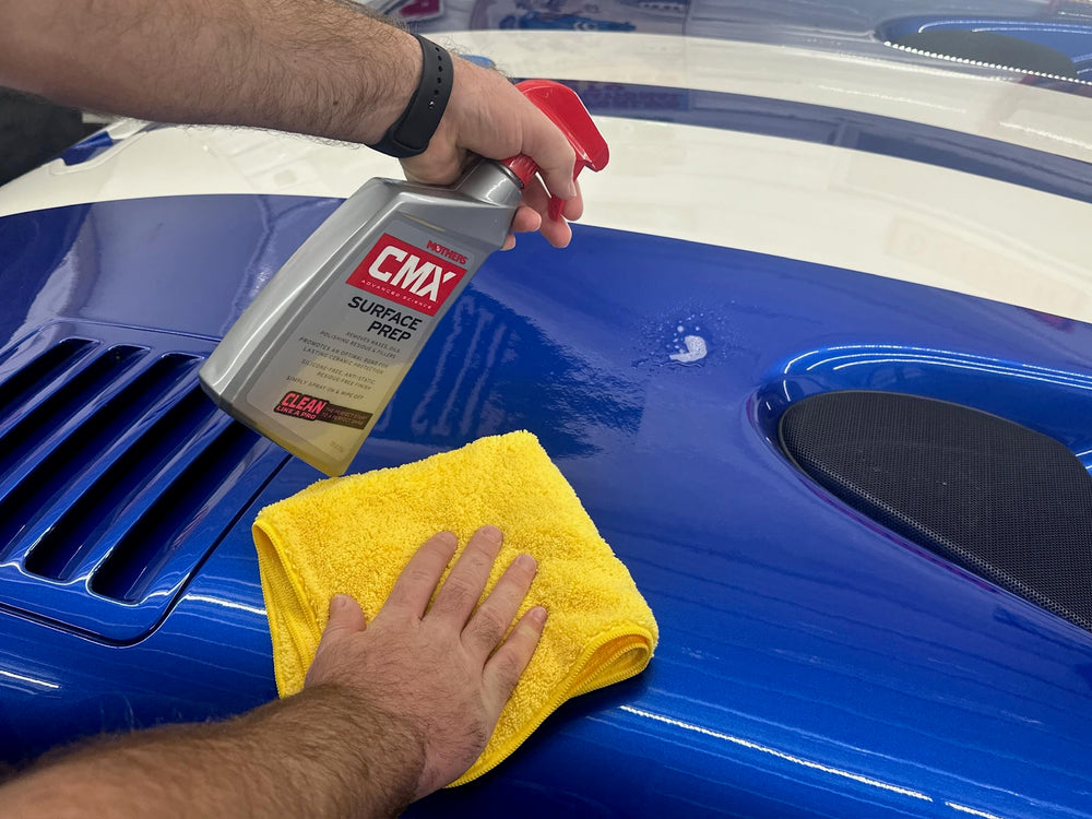 Mothers CMX close-up wiping paint, showing residue-free finish