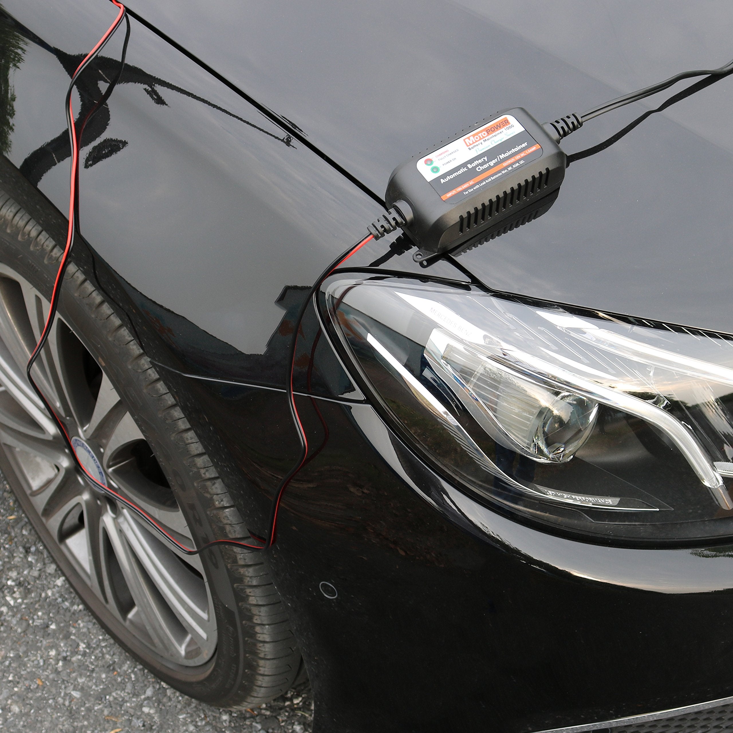 MOTOPOWER packaging with accessories displaying included harness and user convenience