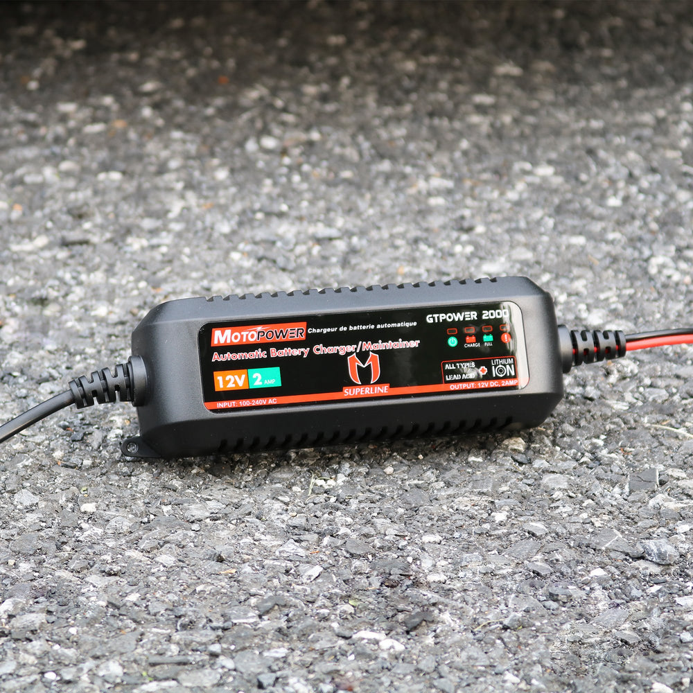 MOTOPOWER connected to a lawn tractor battery showing seasonal battery upkeep