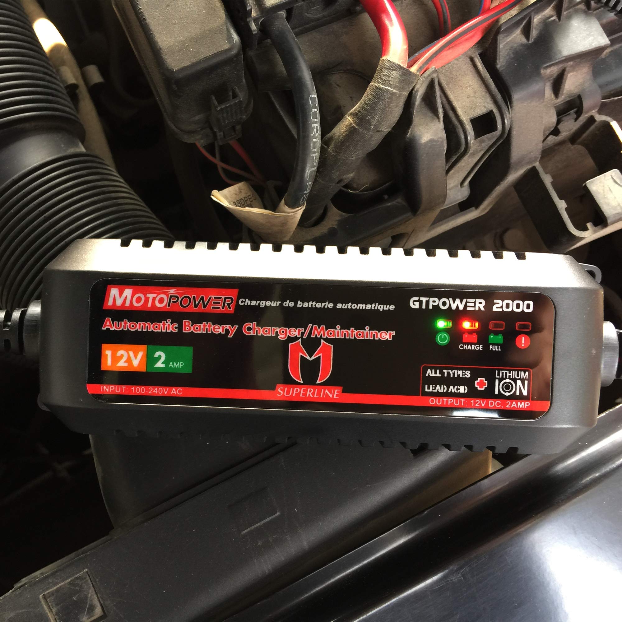 MOTOPOWER mounted on a motorcycle battery showing convenient in-place maintenance
