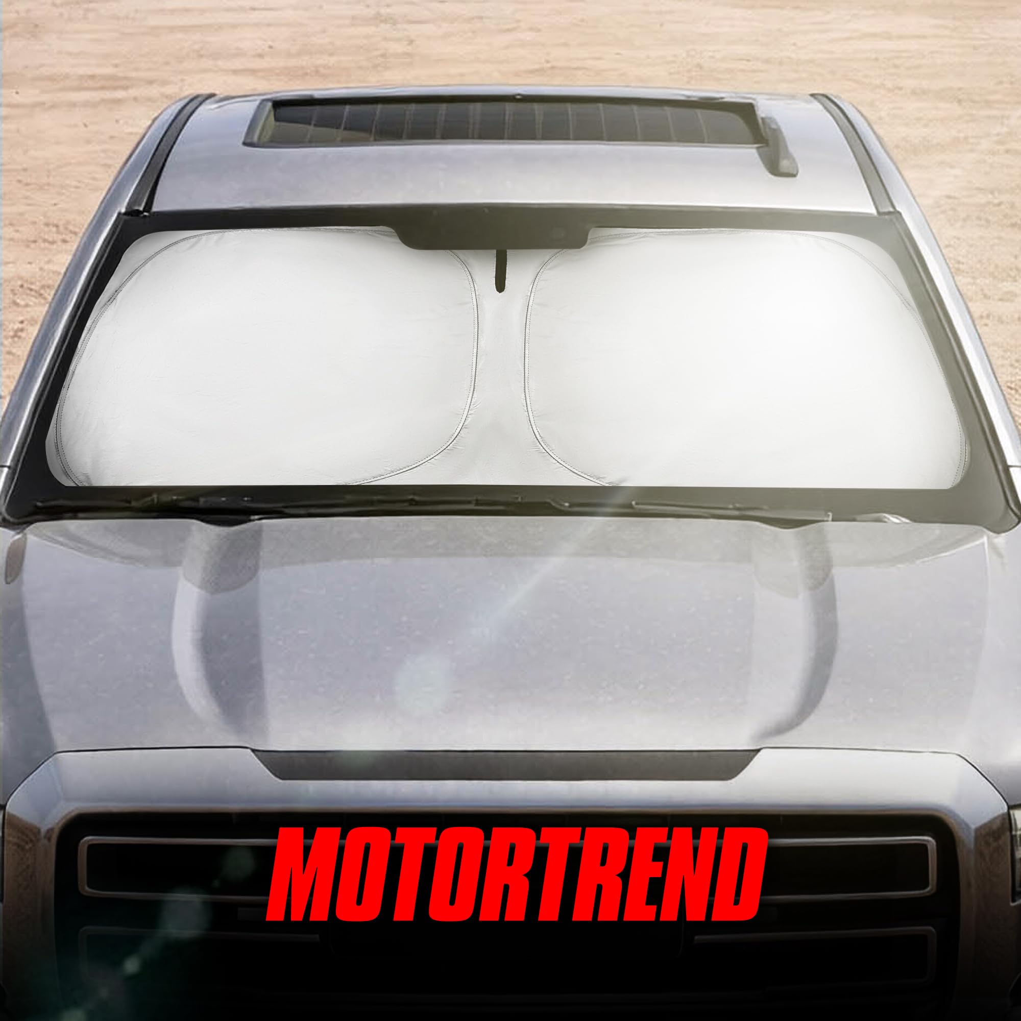 Motor Trend folded shade stored in door pocket for convenient access